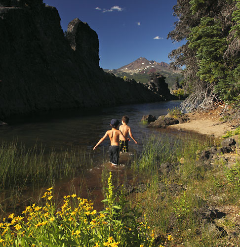 Boys wading at Sparks Lake, Oregon, David Whitten Photo