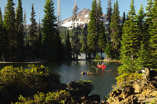 Canoe fishing on Sparks Lake Broken Top near Bend Oregon